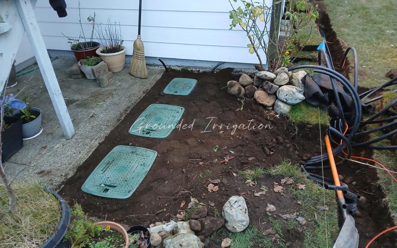 back filled valve boxes lids on